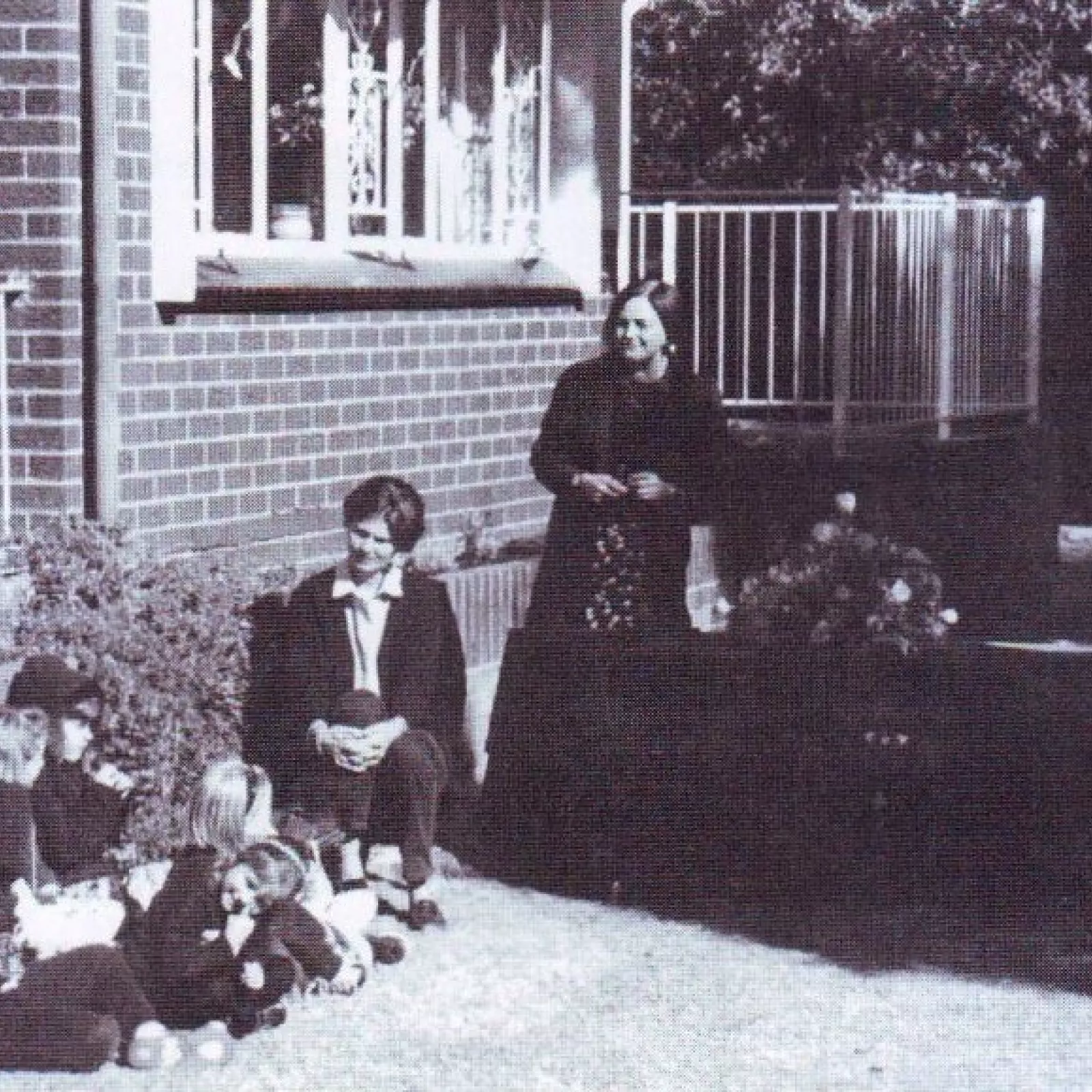 Mrs hallatt and children at little saints