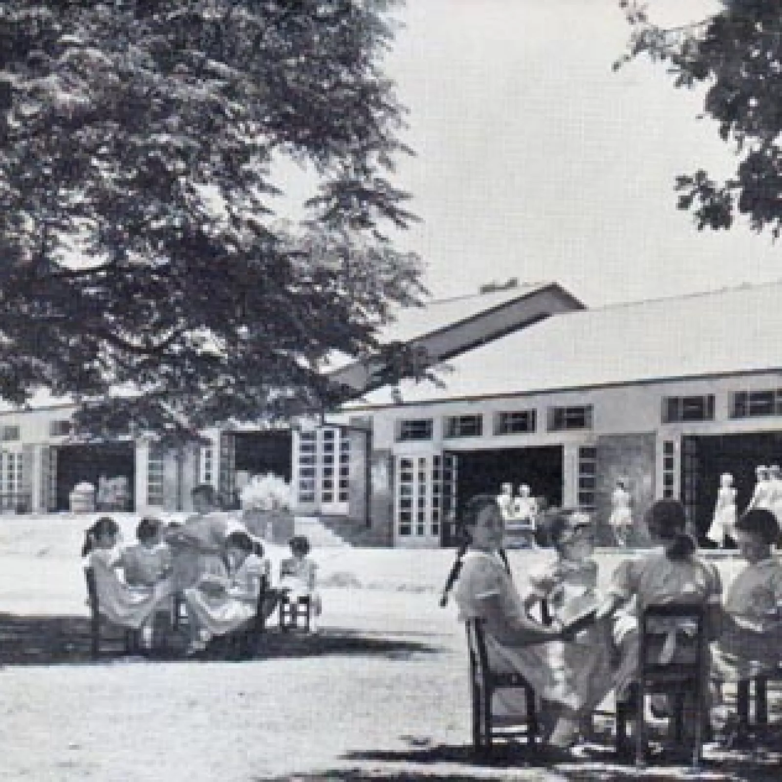 Girls relax in the grounds of the junior school