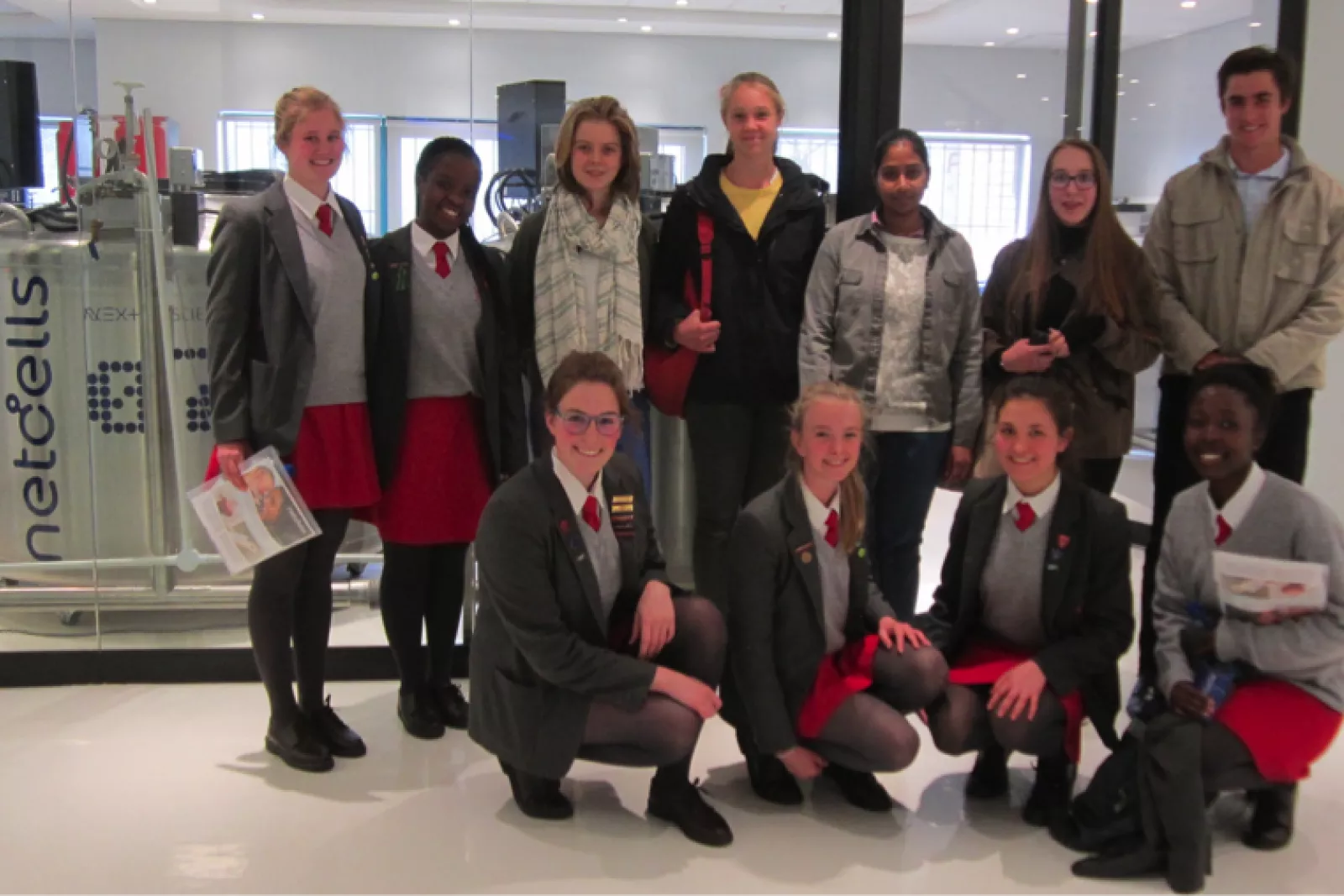 At Next Biosciences laboratory Back row Kirsten Lowery Tanatswa Dendere from St Marys Front row Meg Lendrum May Krause Kyra Dale and Alexis Oduro Domfe