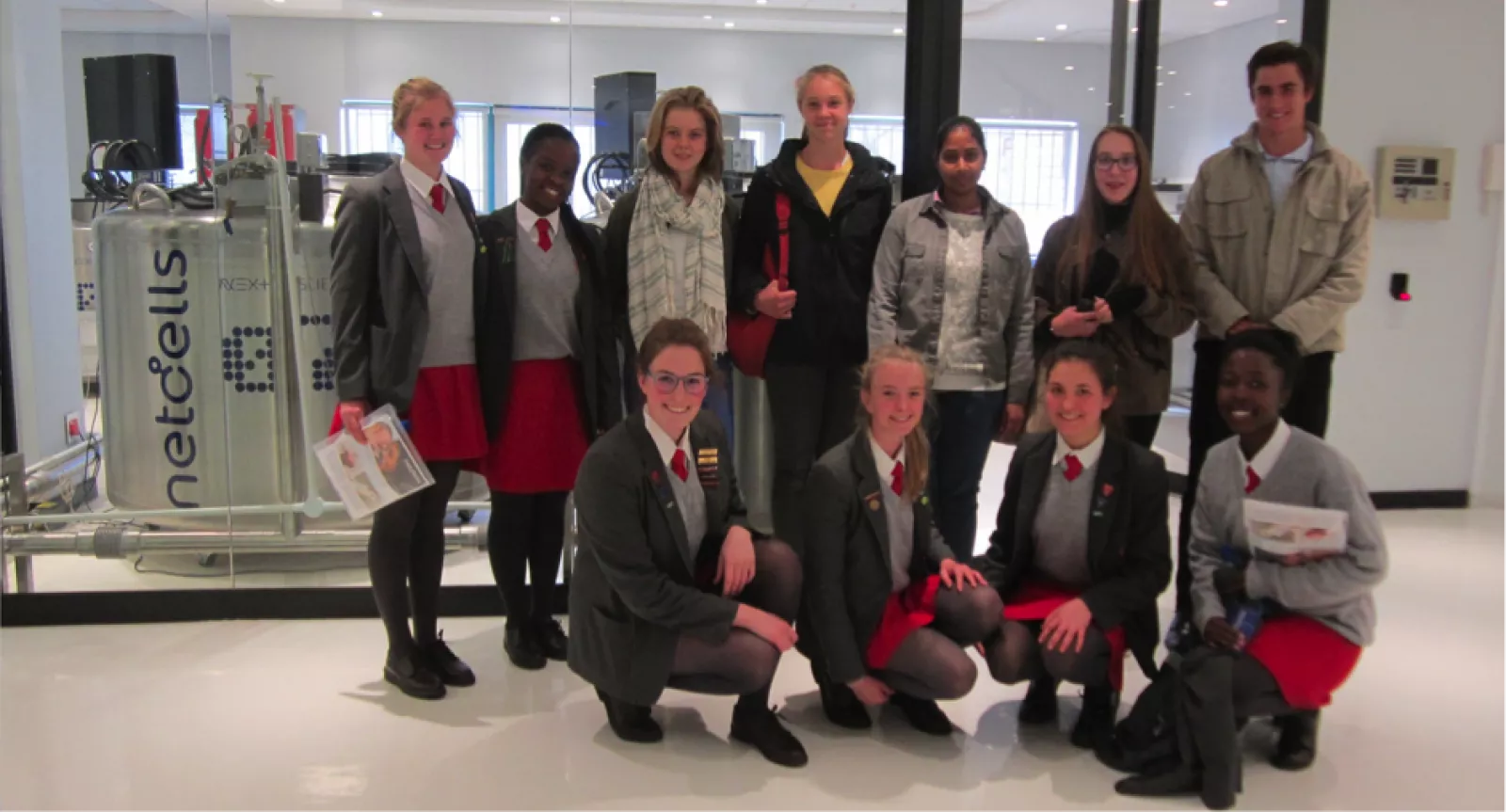 At Next Biosciences laboratory Back row Kirsten Lowery Tanatswa Dendere from St Marys Front row Meg Lendrum May Krause Kyra Dale and Alexis Oduro Domfe