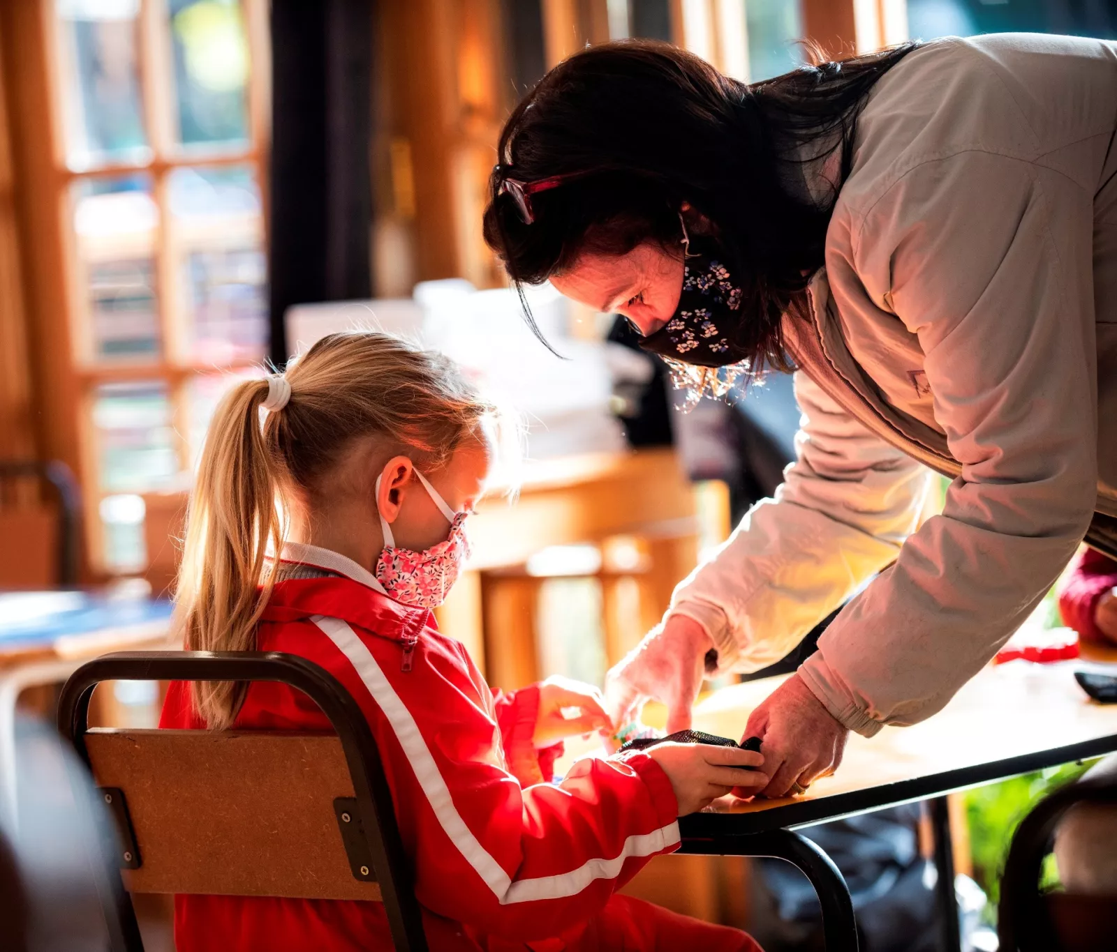 In the Junior School teachers and girls all have to wear masks
