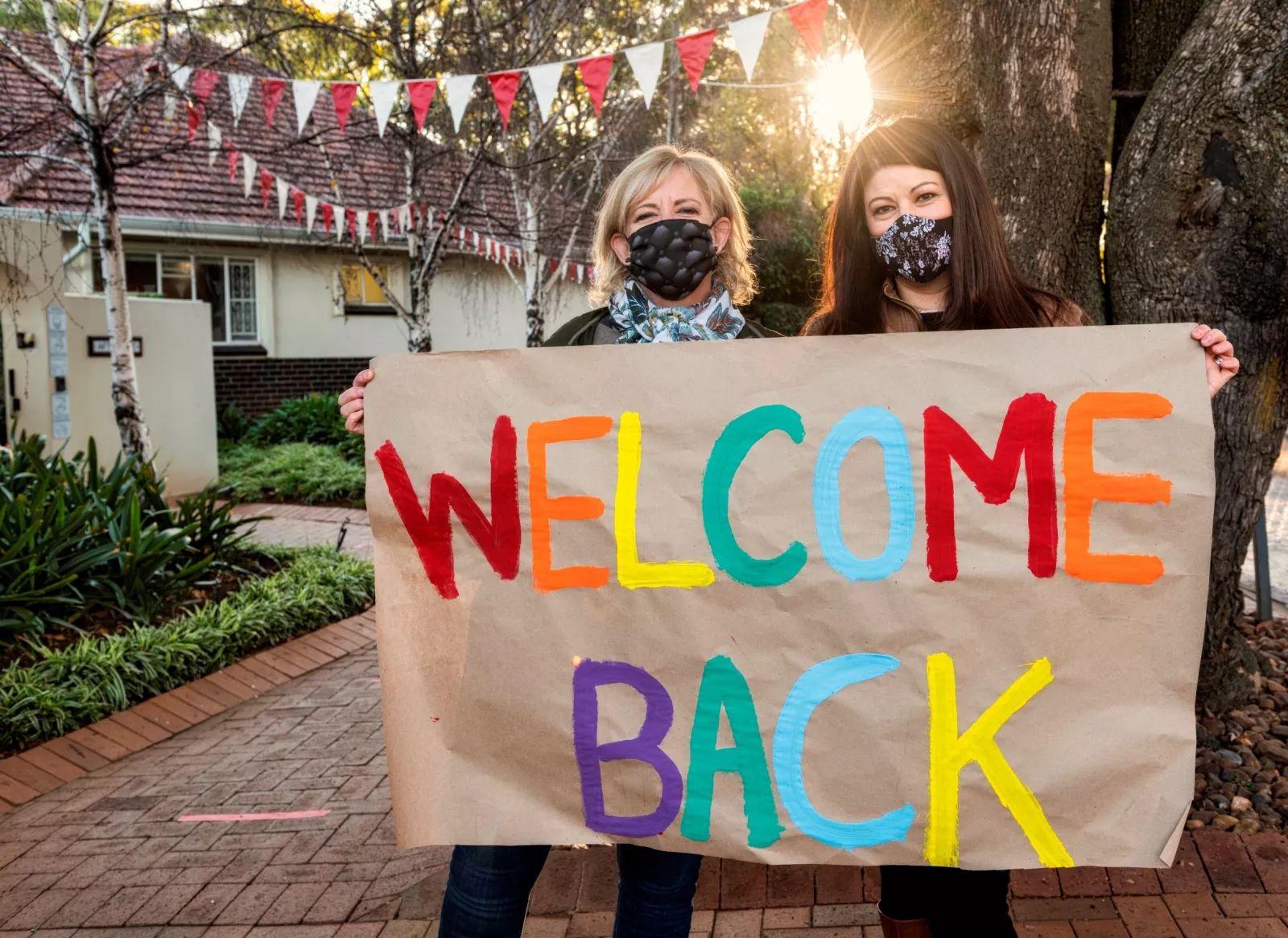 Little Saints teachers welcoming back boys and girls after lockdown has ended