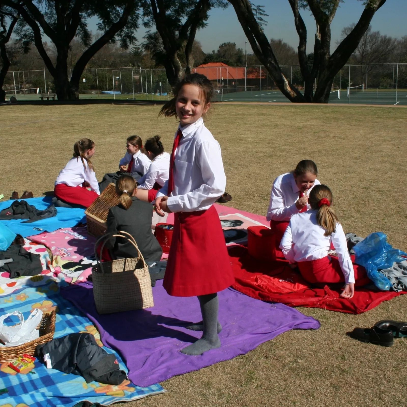 Junior school girls enjoying the2011 patronal festival picnic