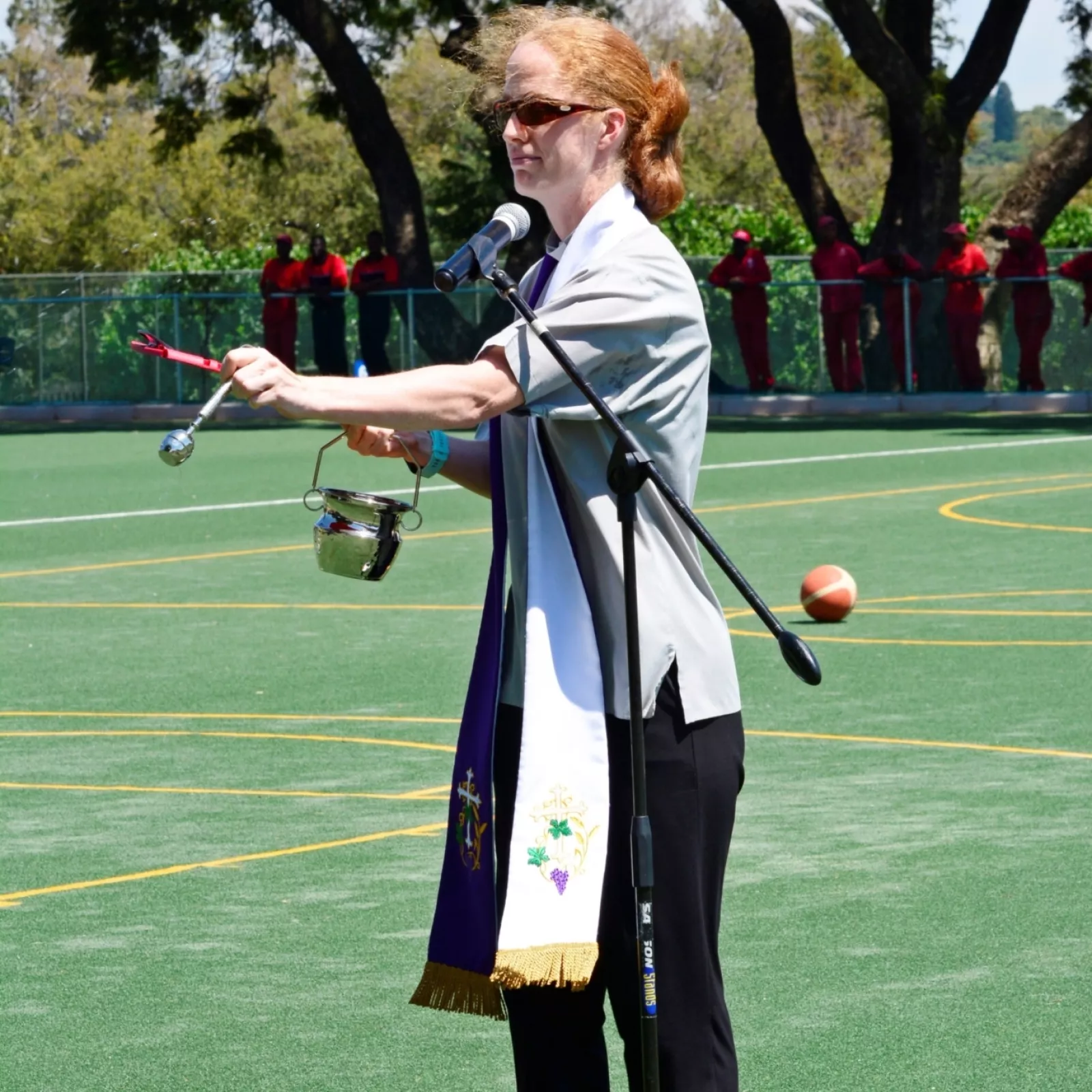 Revd claudia blessing the new field